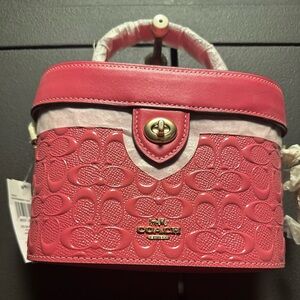 Coach Pink Embossed Mini Bag